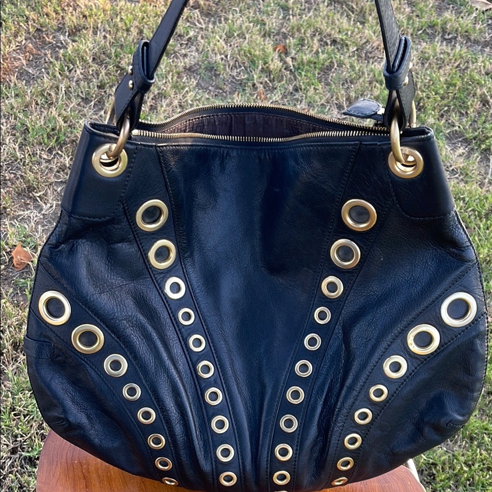 Cole Haan bag with gold rivets